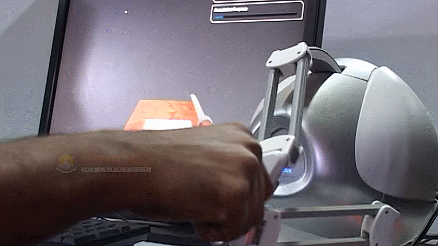 Prototype metal filing simulator with the Novint Falcon