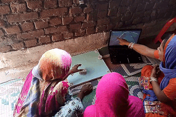 The TUI moves intot the background and becomes an enabler of deeper conversations around sanitation between the participants